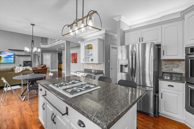 1759 Baybrook Ln, Naperville, IL 60564 - kitchen with stainless steel fridge with ice dispenser, white gas cooktop, a chandelier, white cabinets, and tasteful backsplash