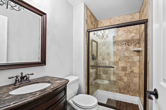 1759 Baybrook Ln, Naperville, IL 60564 - bathroom featuring toilet, a stall shower, and vanity