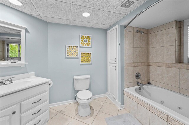 1759 Baybrook Ln, Naperville, IL 60564 - bathroom featuring vanity, toilet, baseboards, tile patterned flooring, and a combined bath / shower with jetted tub