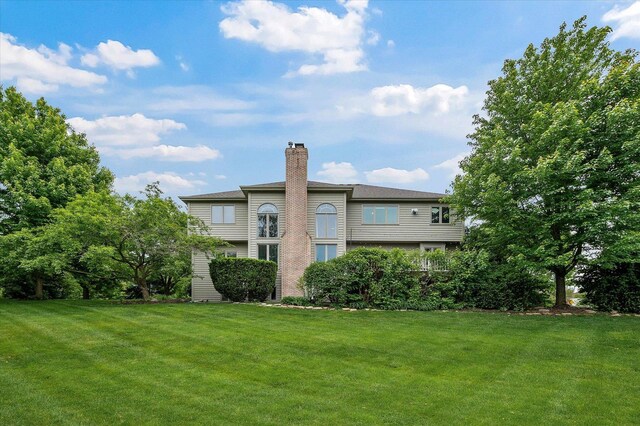 1759 Baybrook Ln, Naperville, IL 60564 - back of property featuring a yard and a chimney