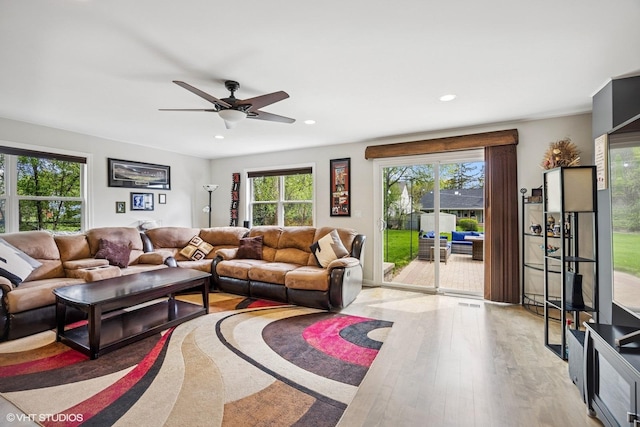 701 N Coolidge Ave, Palatine, IL 60067 - living area featuring plenty of natural light, light wood finished floors, a ceiling fan, and recessed lighting