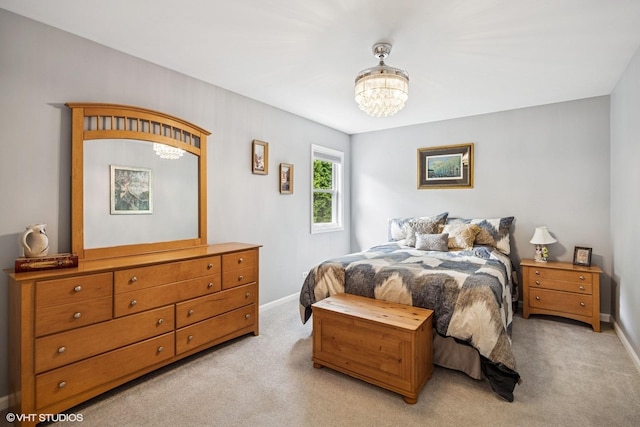 701 N Coolidge Ave, Palatine, IL 60067 - bedroom featuring light carpet, a chandelier, and baseboards