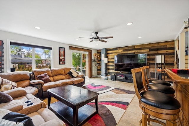 701 N Coolidge Ave, Palatine, IL 60067 - living room with wooden walls, ceiling fan, recessed lighting, and light wood-type flooring