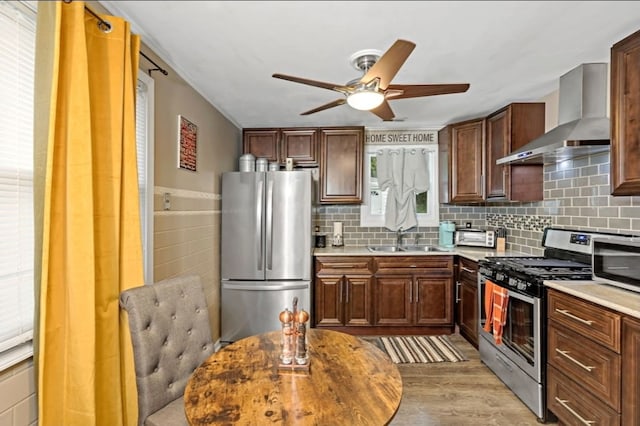 2041 175th St, Homewood, IL 60430 - kitchen with ceiling fan, a sink, wall chimney range hood, light countertops, and appliances with stainless steel finishes