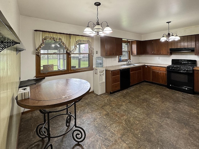 kitchen featuring hanging light fixtures, a notable chandelier, light countertops, extractor fan, and black appliances
