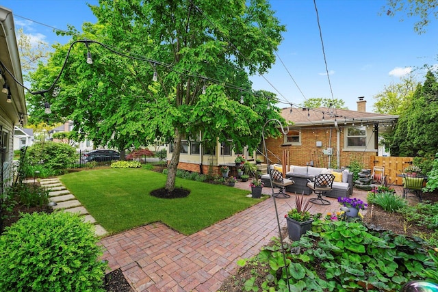 view of yard with an outdoor hangout area and a patio
