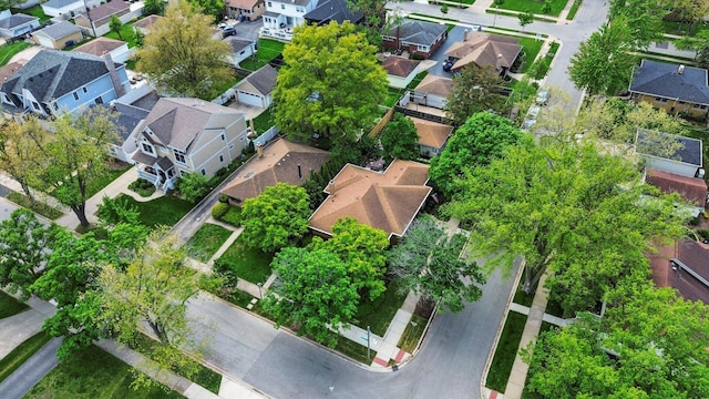 aerial view of property and surrounding area with nearby suburban area