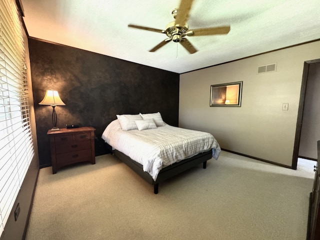 660 Londonberry Ln, Bolingbrook, IL 60440 - bedroom with light carpet, baseboards, an accent wall, and ceiling fan