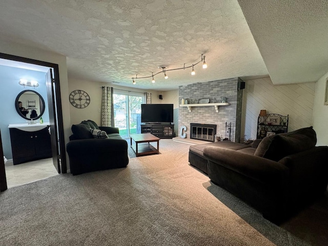 660 Londonberry Ln, Bolingbrook, IL 60440 - carpeted living area with a textured ceiling, a brick fireplace, and wooden walls