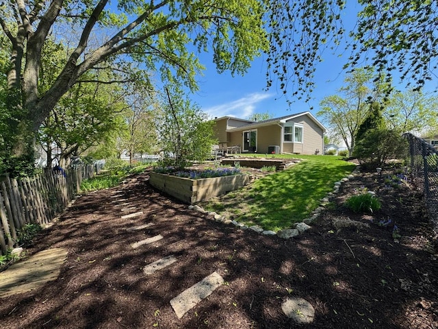 660 Londonberry Ln, Bolingbrook, IL 60440 - view of yard featuring a vegetable garden and a patio