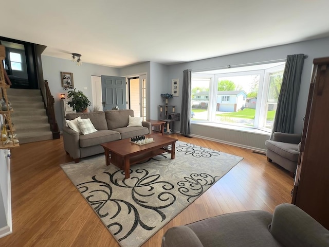 660 Londonberry Ln, Bolingbrook, IL 60440 - living area with light wood-style floors and stairway