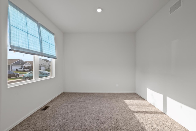 10407 Morse Pl, Crown Point, IN 46307 - spare room featuring baseboards, carpet flooring, and visible vents