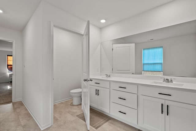 10407 Morse Pl, Crown Point, IN 46307 - full bath featuring double vanity, a sink, recessed lighting, and toilet