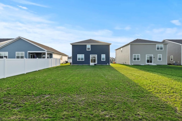 10407 Morse Pl, Crown Point, IN 46307 - back of house featuring a lawn and fence