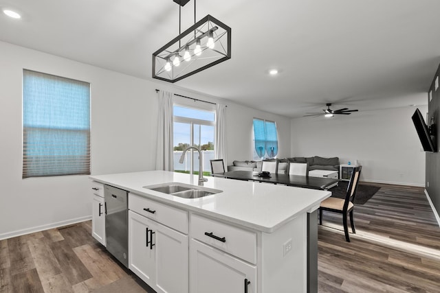 10407 Morse Pl, Crown Point, IN 46307 - kitchen with stainless steel dishwasher, ceiling fan, dark wood-style floors, recessed lighting, and a sink