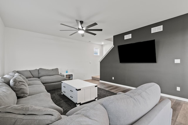 10407 Morse Pl, Crown Point, IN 46307 - living area featuring visible vents, baseboards, ceiling fan, and wood finished floors