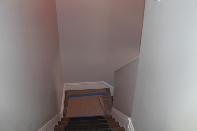 staircase with baseboards
