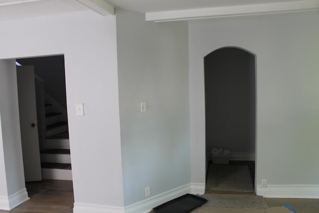 finished basement with hardwood / wood-style floors and baseboards