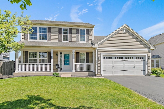 10134 Ashley St, Huntley, IL 60142 - view of front facade with a porch, asphalt driveway, and an attached garage
