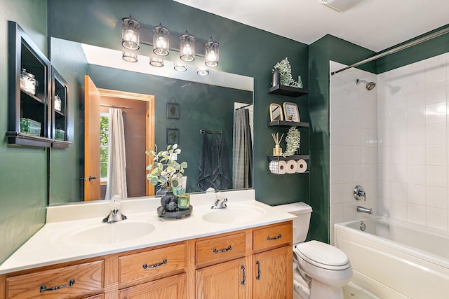 10134 Ashley St, Huntley, IL 60142 - full bathroom featuring toilet, shower / bathtub combination with curtain, and double vanity