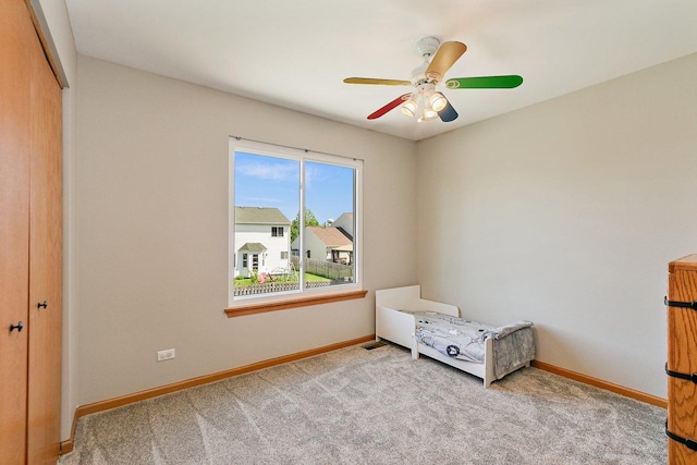 10134 Ashley St, Huntley, IL 60142 - carpeted bedroom featuring baseboards, a closet, and ceiling fan