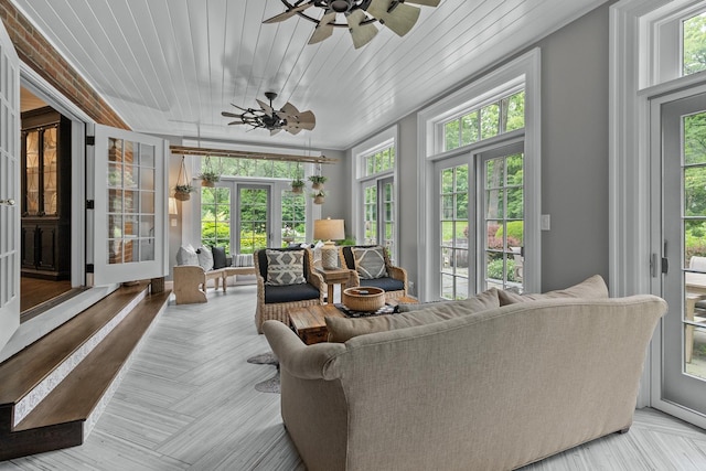 sunroom / solarium with wood ceiling and french doors