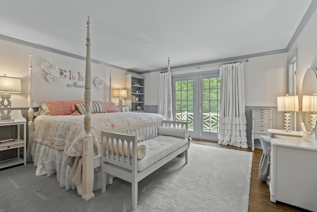 bedroom with access to outside, crown molding, and wood finished floors