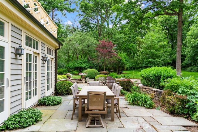 view of patio featuring outdoor dining space and french doors