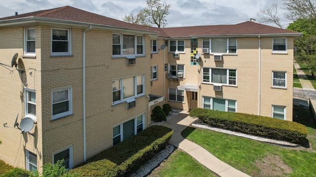 view of property with cooling unit