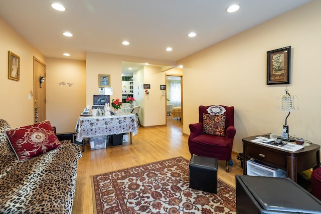 living room featuring recessed lighting and wood finished floors