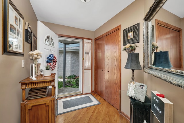 foyer entrance featuring light wood finished floors