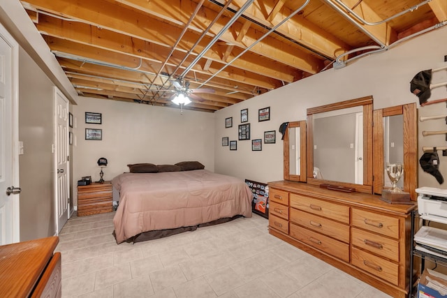 bedroom with light tile patterned flooring