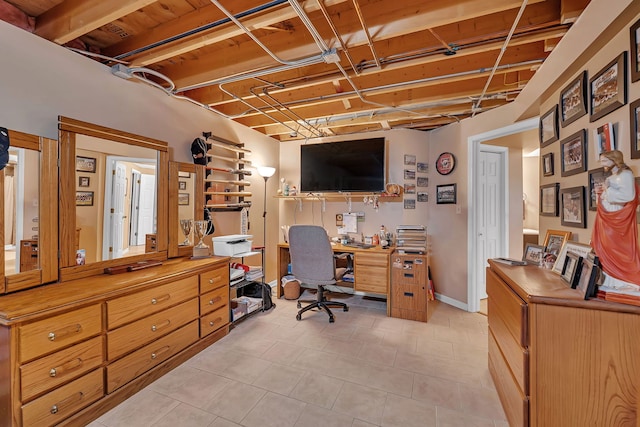 home office with light tile patterned floors