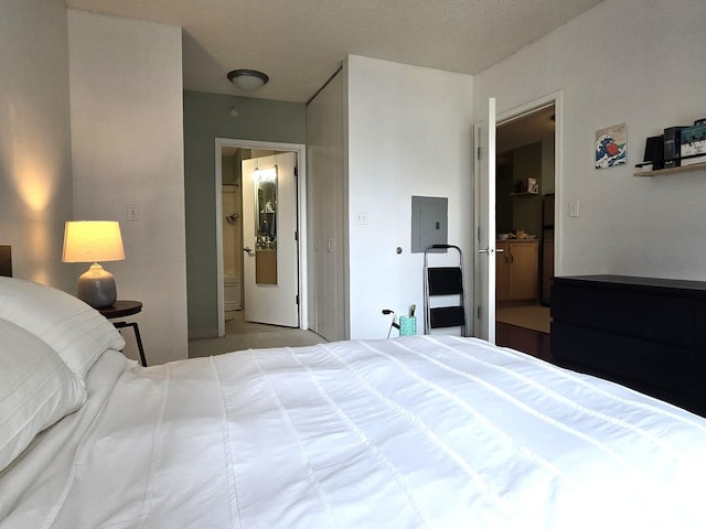 bedroom featuring electric panel