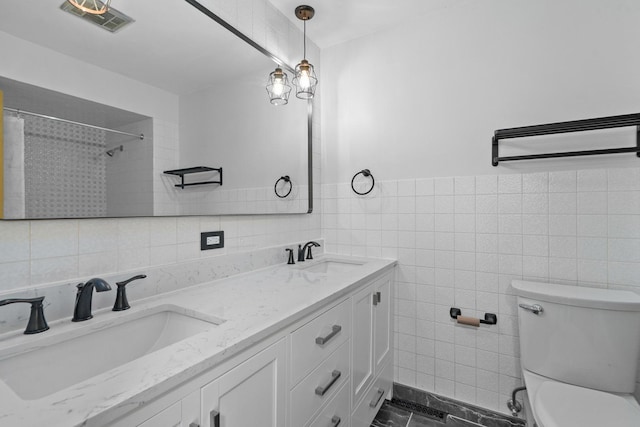 13001 S Westgate Dr, Palos Heights, IL 60463 - full bath with tile walls, toilet, tiled shower, and vanity