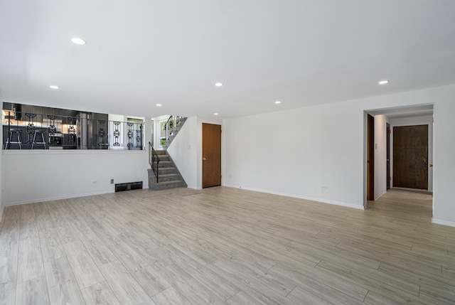 13001 S Westgate Dr, Palos Heights, IL 60463 - unfurnished living room featuring light wood-type flooring, recessed lighting, a premium fireplace, and baseboards