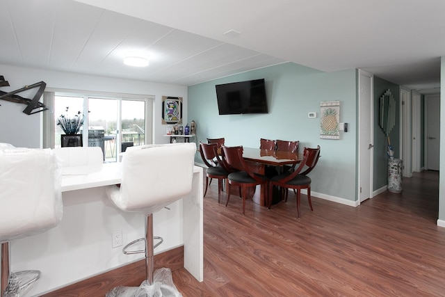 2900 Maple Ave Unit 19E, Downers Grove, IL 60515 - dining room featuring baseboards and wood finished floors