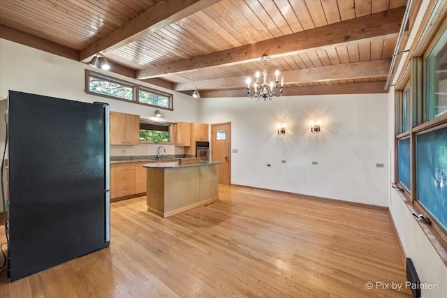5010 Shady Oaks Ln, Crystal Lake, IL 60012 - kitchen featuring stainless steel appliances, light brown cabinetry, a chandelier, a wood ceiling with exposed beams, and light wood-style flooring