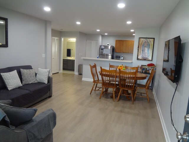 2013 Silverstone Dr Unit 2013, Carpentersville, IL 60110 - dining space featuring a toaster, baseboards, recessed lighting, and light wood-style flooring