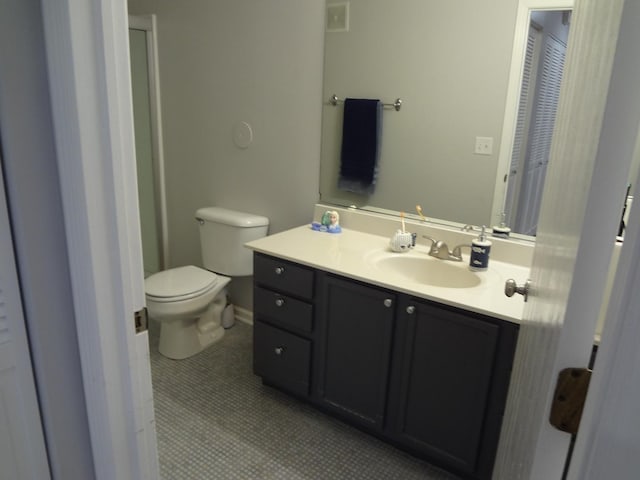2013 Silverstone Dr Unit 2013, Carpentersville, IL 60110 - bathroom with vanity, tile patterned floors, and toilet