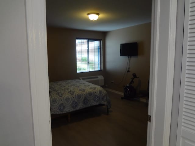 2013 Silverstone Dr Unit 2013, Carpentersville, IL 60110 - bedroom featuring baseboards and wood finished floors
