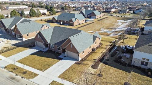 birds eye view of property with a residential view