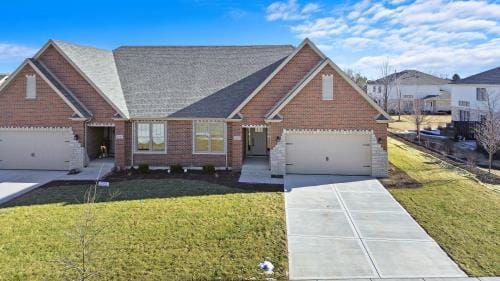 view of front facade with a garage, concrete driveway, and a front lawn