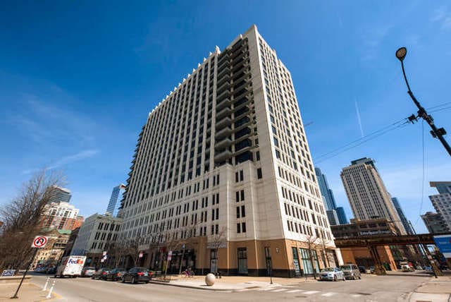 view of building exterior featuring a view of city