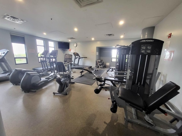 1255 S State St Unit 906, Chicago, IL 60605 - exercise room with a healthy amount of sunlight, recessed lighting, and visible vents