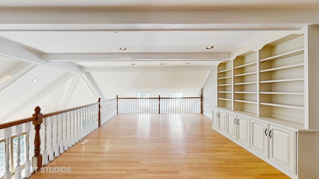 8980 N Enclave Dr, Burr Ridge, IL 60527 - hall with light wood-style flooring, built in features, and an upstairs landing