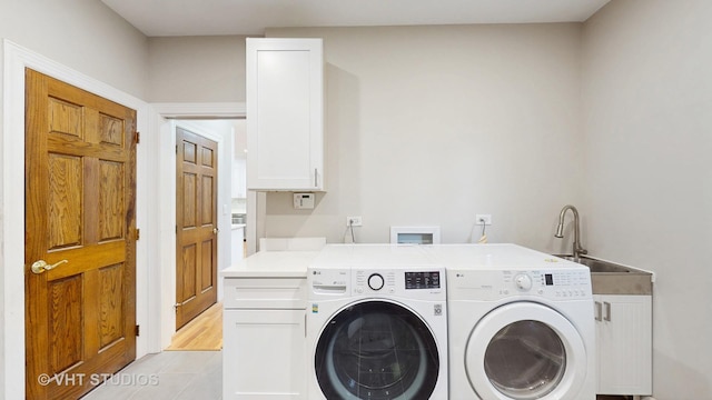 8980 N Enclave Dr, Burr Ridge, IL 60527 - washroom featuring cabinet space and washer and clothes dryer