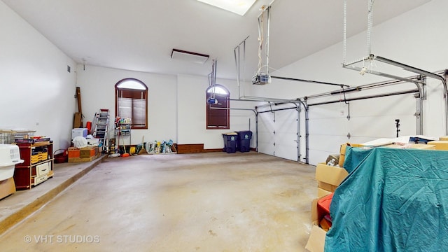 8980 N Enclave Dr, Burr Ridge, IL 60527 - garage featuring a garage door opener