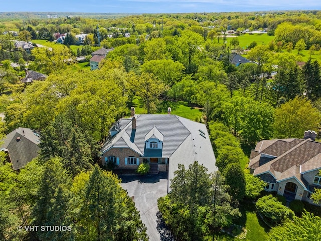 8980 N Enclave Dr, Burr Ridge, IL 60527 - aerial view of property and surrounding area with a heavily wooded area