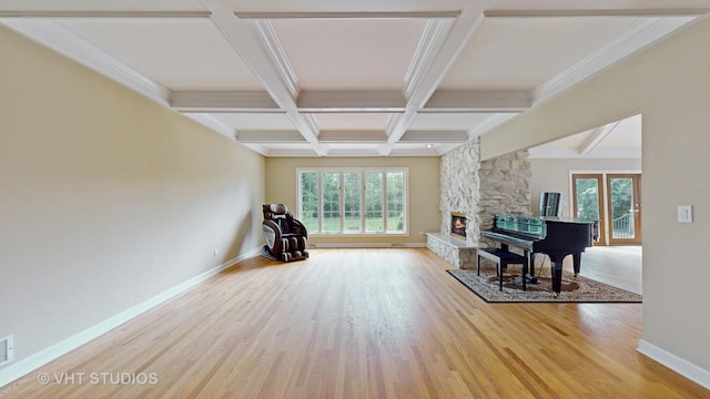 8980 N Enclave Dr, Burr Ridge, IL 60527 - living area featuring wood finished floors, baseboards, beamed ceiling, a stone fireplace, and coffered ceiling